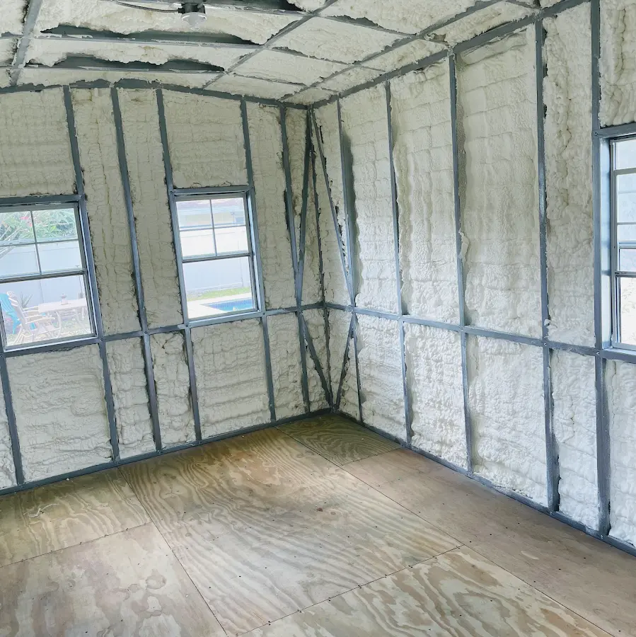 Closed-cell spray foam insulation applied to wall cavities in a residential project in Haddam
